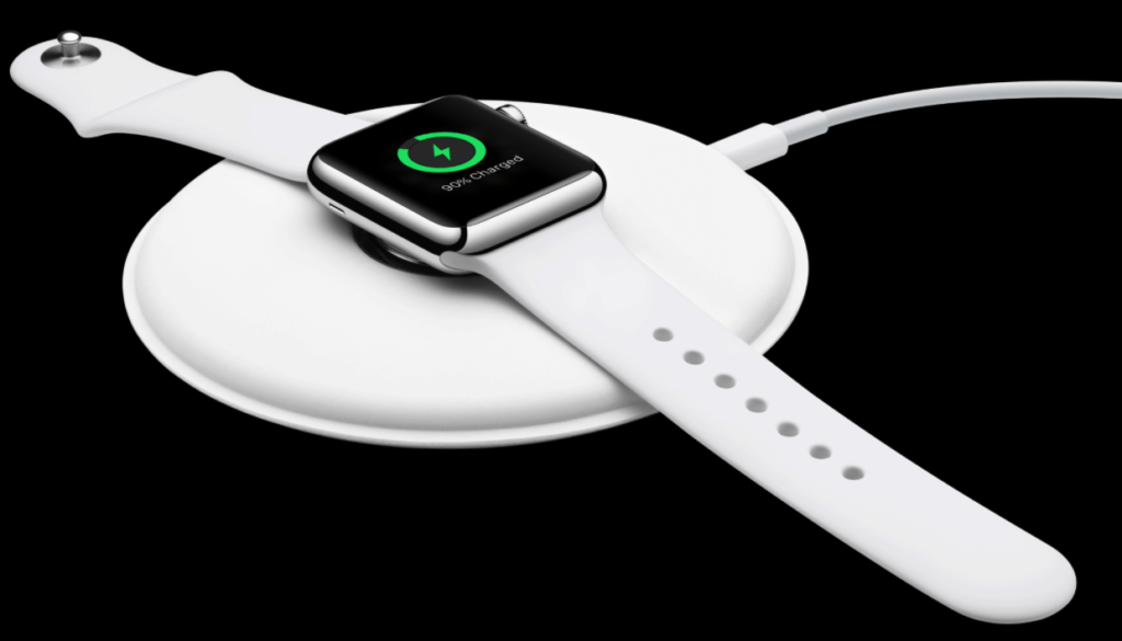 Charge a smartwatch with a wireless charging pad.